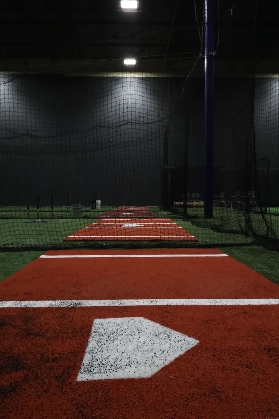 A batting lane viewed from behind home plate